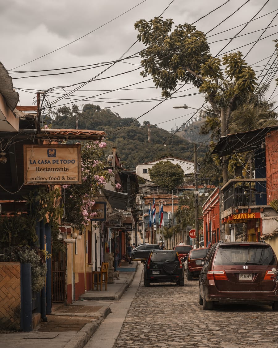 Street of Copán Ruinas with hills behind