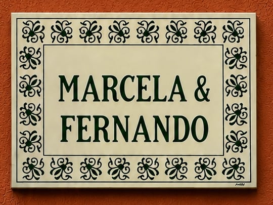 Hand-painted tile reading Marcela & Fernando