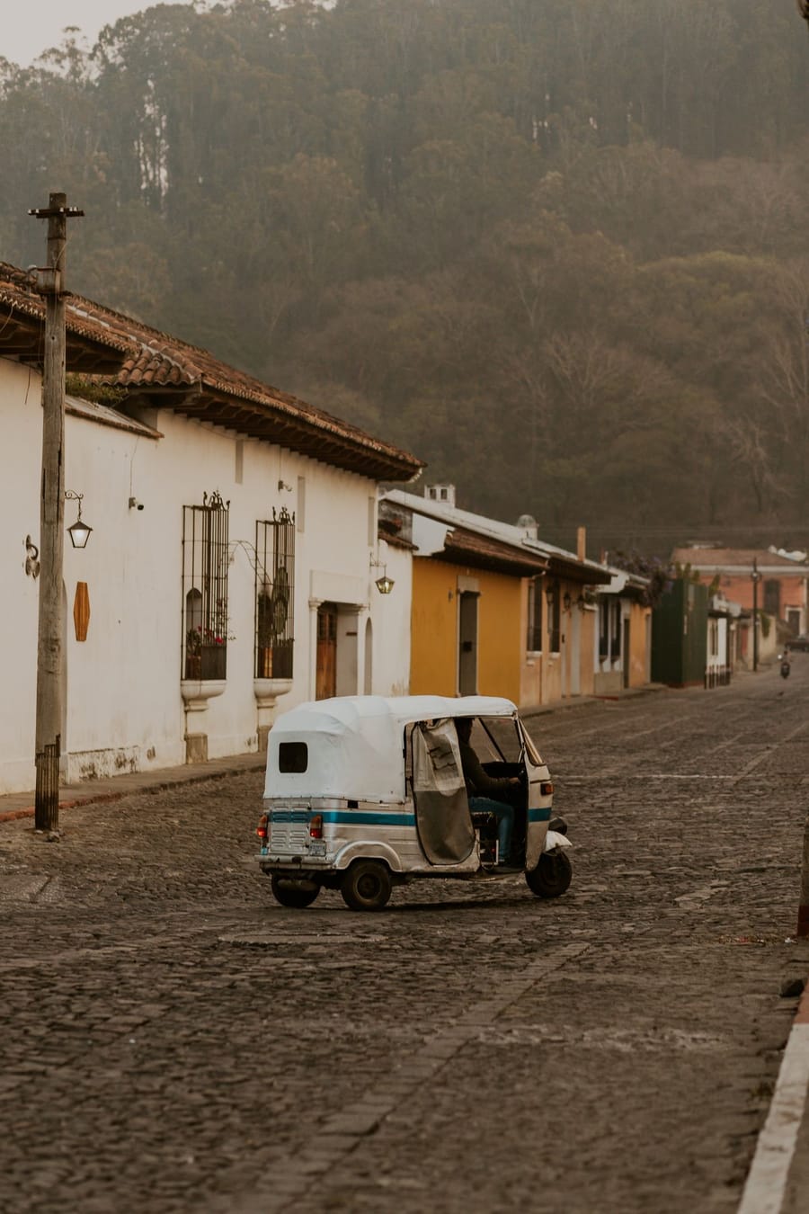 Tuk-tuk on a cobblestone street in Copán Ruinas